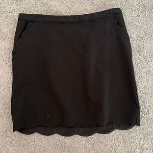 Black skirt with scalloping. Skies and blue XXL